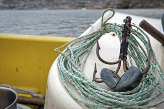 Fishing hook and line, Inuit hunter, near the Inuit settlement of Tiniteqilaaq or Tiilerilaaq,