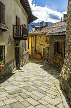 Road to border pass Great Sankt Bernhard (Col du Grand Saint-Bernard), mountain village of Bourg de