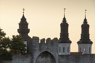 Towers of St Mary's Church or Visby Cathedral, old city wall, former Hanseatic city of Visby,