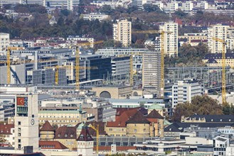 Central station with construction site Stuttgart 21, city centre with collegiate church, town hall