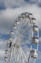 The solar-powered Ferris wheel at the Colmar Christmas market in 2022. Alsace, France, Europe