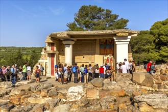 Knossos, Greece, April 27, 2019: People visiting Crete landmark, ruins of Minoan Palace, Europe