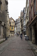 Rouen, France, August 30, 2018: Old houses in the tourist center of Rouen, built in the traditional