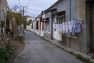 House laundry hanging on a rope and drying outdoor in the clean air saving the environment. Nicosia