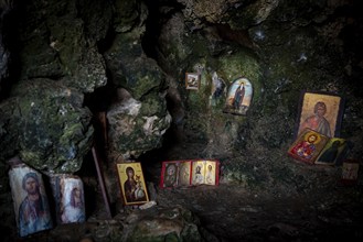 Protaras, Cyprus, August 6 2020: Interior of an old church cave with Christian saint. Ayioi Saranta