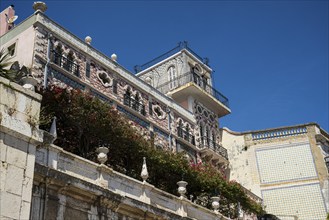 Colourful facade in Lisbon, Historic building with decorative facade and balconies surrounded by