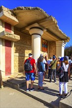 Knossos, Greece, April 27, 2019: People visiting Crete landmark, ruins of Minoan Palace, Europe