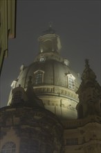 Dresden's old town shrouded in November fog. Church of Our Lady, Foggy atmosphere in Dresden,