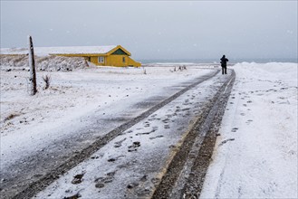 Empty highway countryside frozen road with snow in winter in Iceland