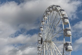 The solar-powered Ferris wheel at the Colmar Christmas market in 2022. Alsace, France, Europe