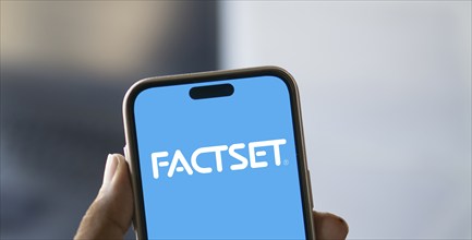 Dhaka, Bangladesh- 09 Nov 2024: Factset logo is displayed on smartphone