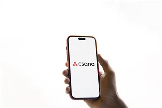 Dhaka, Bangladesh- 09 Nov 2024: Asana logo is displayed on smartphone