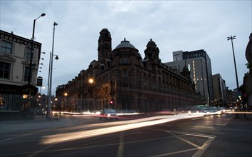 Manchester, United Kingdom, September 24 2016: Light trails of cars and buses moving with speed at