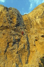 Rock climber on a steep rock. Cape Alchak Crimea