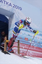 Sportswoman starter mountain skier at start line slalom, Alpine Skiing Cup at Russian Alpine Skiing