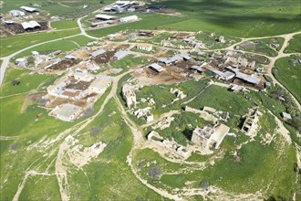 Drone aerial view of an abandoned deserted village. Ruins of deserted old town. Petrofani,