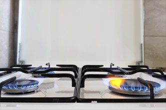 Energy efficiency concept with gas cooker – the cost of natural gas is more expensive. Close up,