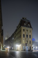 Dresden's Old Town shrouded in November fog. Rampische Straße, foggy atmosphere in Dresden,