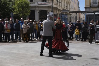 Madrid, Spain, May 2 2024: Spanish dancers dancing flamenco dance in the streets of Madrid Spain.