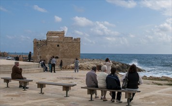 Paphos, Cyprus, March 07 2021: Tourist people enjoying the scenery at paphos castle area in cyprus,