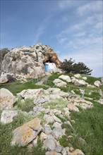 Christian orthodox cave church against blue cloudy sky. Agioi saranta holy chapel Protaras Cyprus