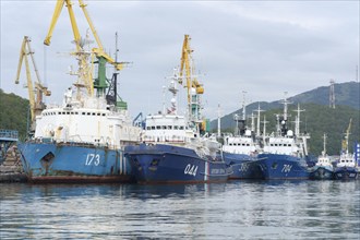 Group of warships Coast Guard of Border Guard Service of Russian FSB anchored at pier in