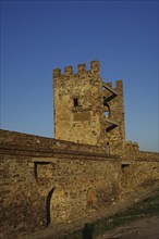 Sudak fortress in Crimea, a tower and part of the wall