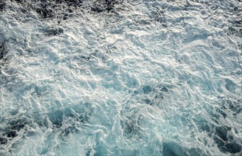 Background abstact of foam from sea waves in the ocean