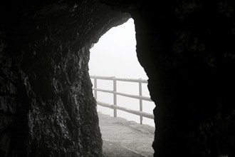 View from the tunnel into the icy mountain landscape