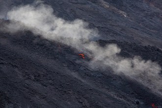 Glowing lava on lava rock from Stromboli crater