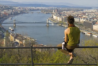 Man enjoying Budapest from Geller hill in Budapest, Hungary, Europe