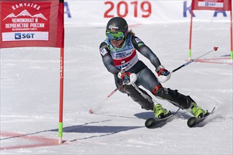 MOROZNAYA MOUNT, KAMCHATKA PENINSULA, RUSSIA, MARCH 30, 2019: Mountain skier Maria Shkanova Belarus