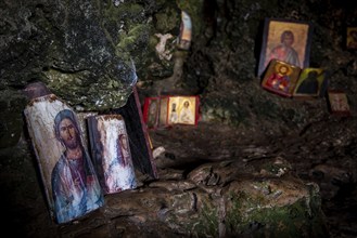 Protaras, Cyprus, August 6 2020: Interior of an old church cave with Christian saint. Ayioi Saranta