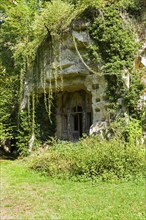 The entrance to the quarry where the stone for the castle of Grand Mello was mined. Fragments of an