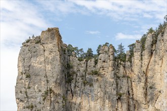 Big cliff seen from hiking trail on the corniches of Causse Mejean above the Tarn Gorges. La