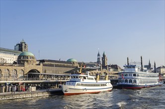 Ferries at the Landungsbrücken quay on the Elbe river in Hamburg, Germany, Europe