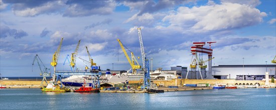 Ancona, Italy, the port with cranes and ships loaded, banner, Europe