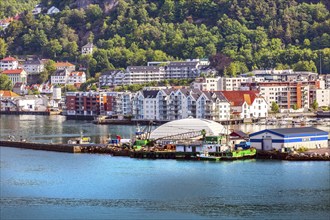 Bergen, Norway, July 30, 2018: City view from the sea with Bryggen harbor, port and colorful