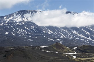 Volcanic landscape of Kamchatka Peninsula: beautiful summer view of cone of active Plosky Tolbachik