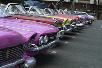 Vintage classic colorful cars parked at Havana city Cuba