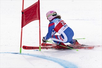 KAMCHATKA PENINSULA, RUSSIA, APR 2, 2019: Mountain skier Girina Vitalina Moscow Region skiing down