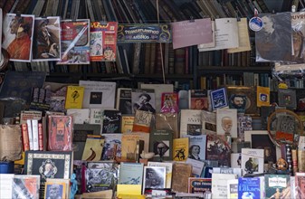 Madrid, Spain, May 2 2024: Bookstore with a variety of vintage books stacked on bookshelf for sale