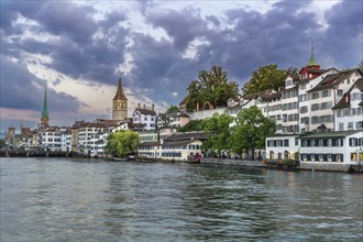 Embankment of Limmat river with historic houses in Zurich city center, Switzerland, Europe