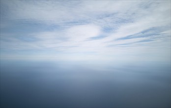 Cloudscape from above. blue sky cumulus clouds. Earth from above. Nature background