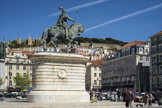 Estátua Equestre de Dom João I in Lisbon, equestrian statue in a lively square surrounded by urban