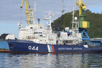 Russian warships Coast Guard of Border Guard Service of Russian FSB anchored at pier in sea port of