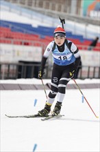 Korean biathlete sportswoman Choi Yoonah Korea skiing on distance biathlon complex during Open