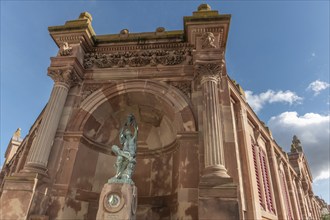 The statue of the winegrower, work of Auguste Bartholdi in front of the covered market in the city