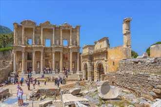 Kusadasi, Turkey, April 28, 2019: People visiting Celsus Library and old ruins of Ephesus or Efes