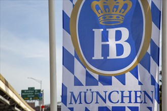 Flag of Hofbräuhaus Munich on a highway in America